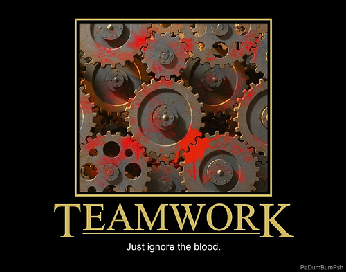 Demotivator: A gear mechanism covered in blood. Caption: 